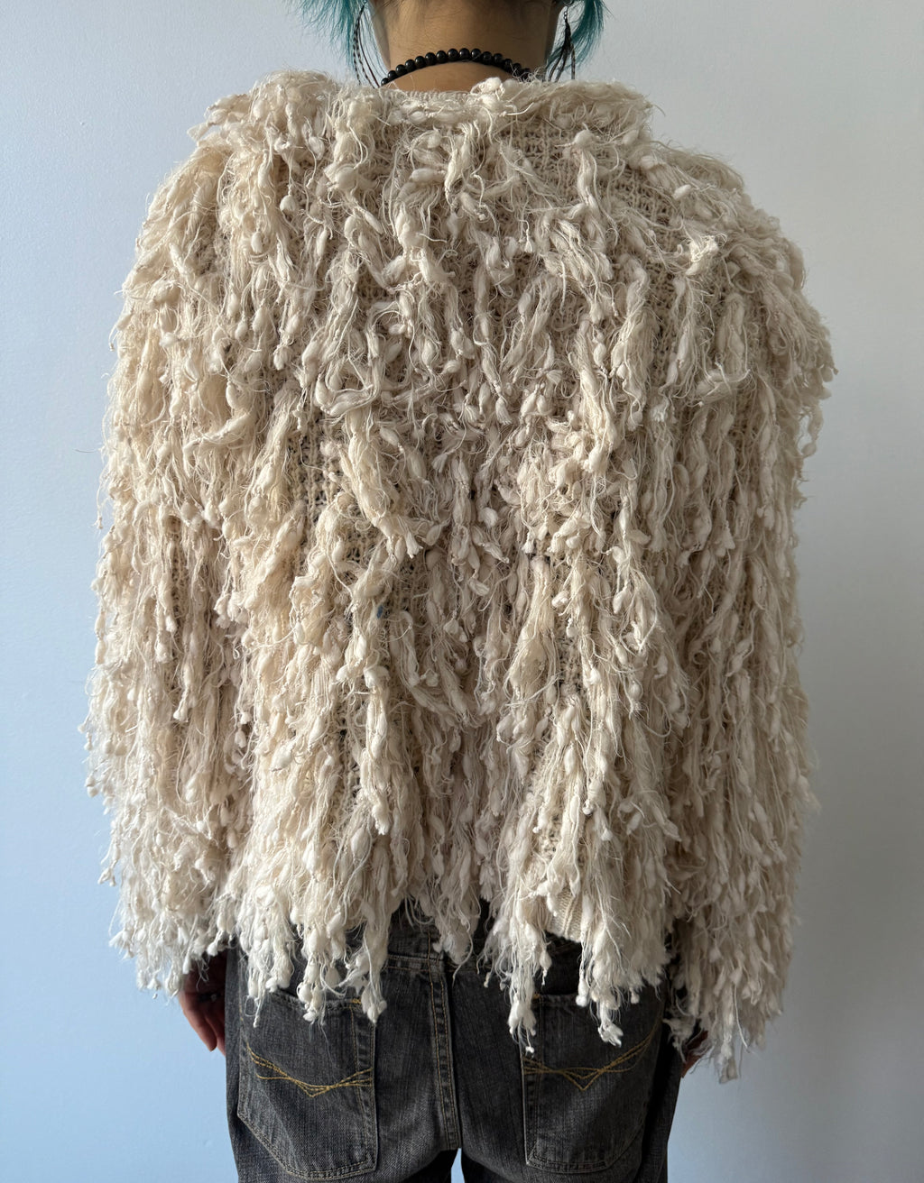 cream shaggy coat