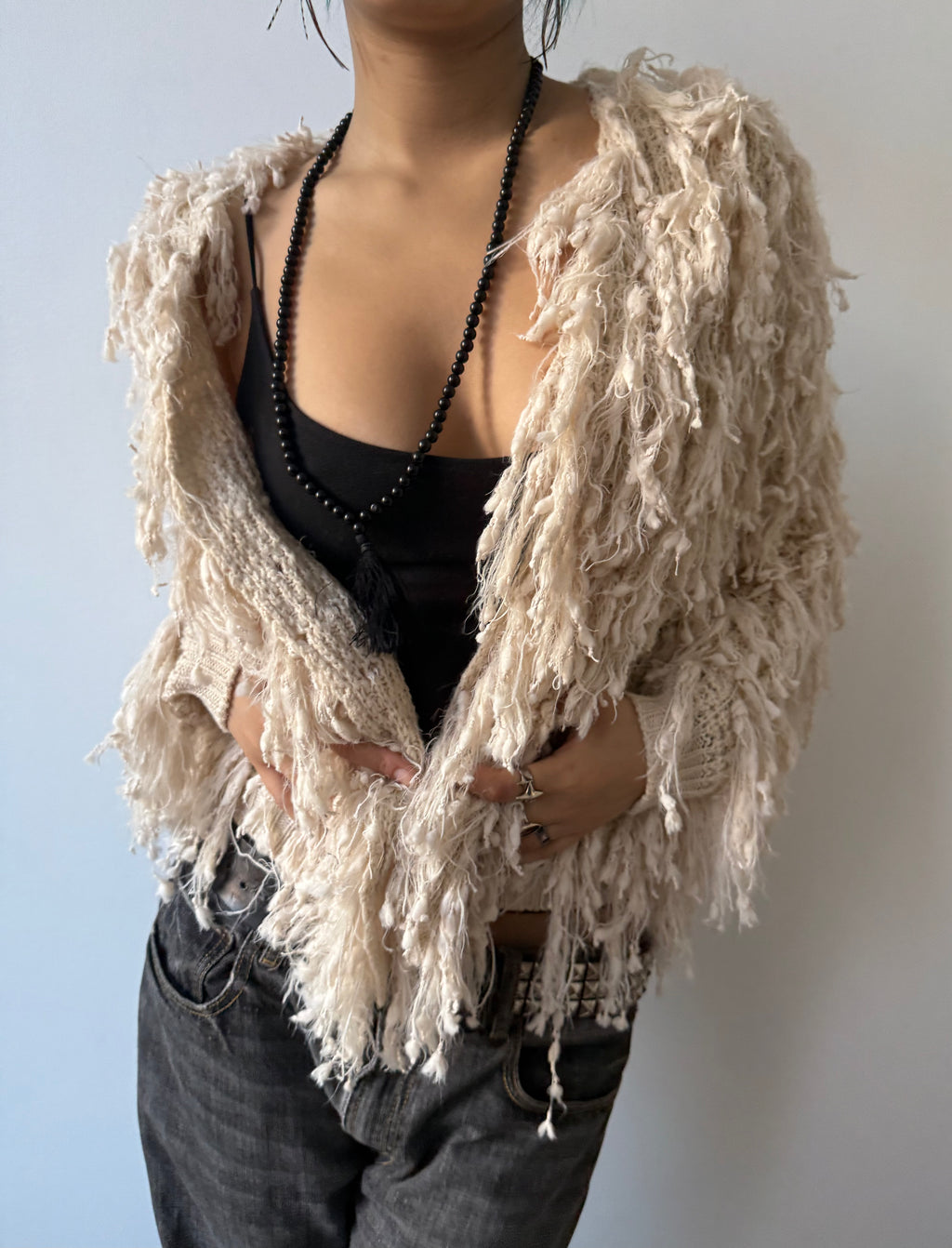 cream shaggy coat